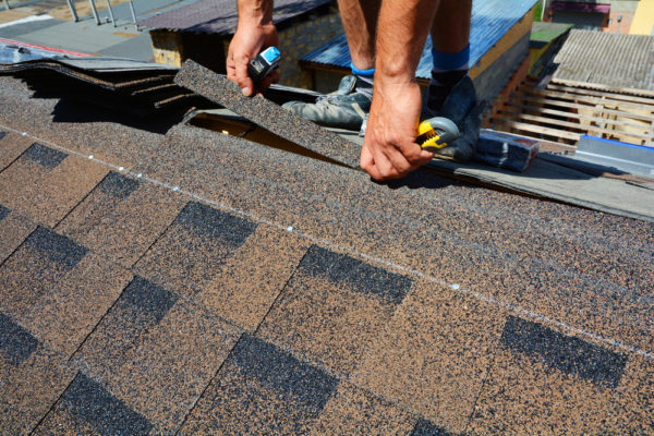 Repairing,Of,Roof,By,Cutting,Felt,Or,Bitumen,Shingles,During